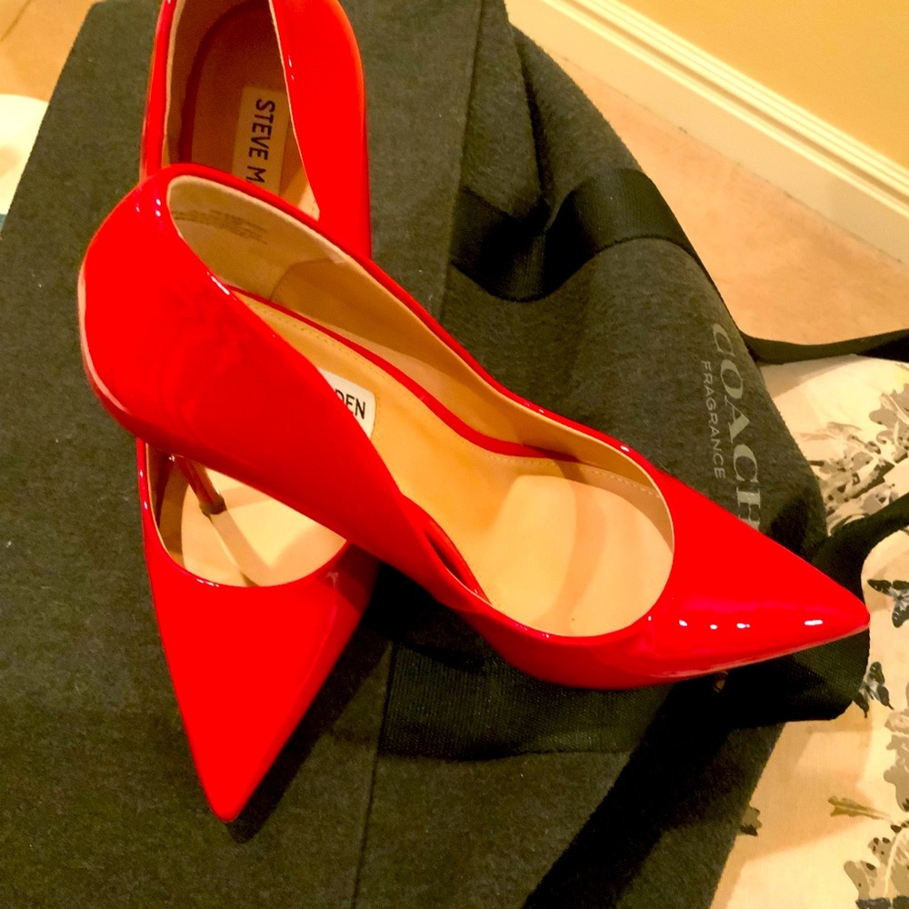 Red Steve Madden pumps,almost never worn.